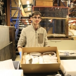 Norfolk Collections Centre Volunteer with packaged box